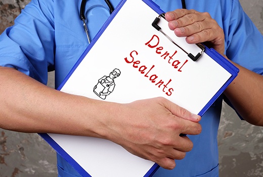 Dental sealants written on clipboard